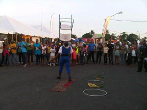 If my memory serves me well then I do believe he's balancing the chair on his face